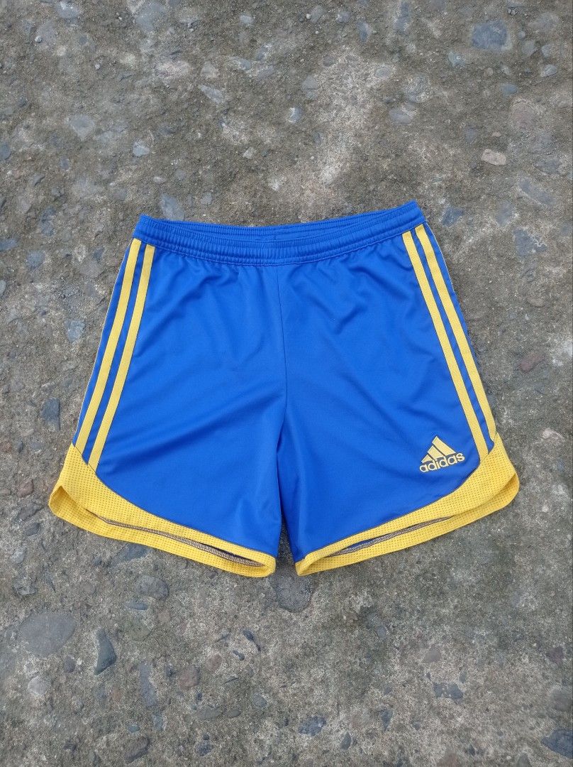 Adidas athletic shorts yellow three-stripe side (Category: Activewear) located in Guiguinto. Submitted by selected_3rp (Listing ID 1468025499, Image 1). Description: Adidas athletic shorts yellow three-stripe side accents, yellow hem piping, and an embroidered Adidas logo. size large no issue pm.