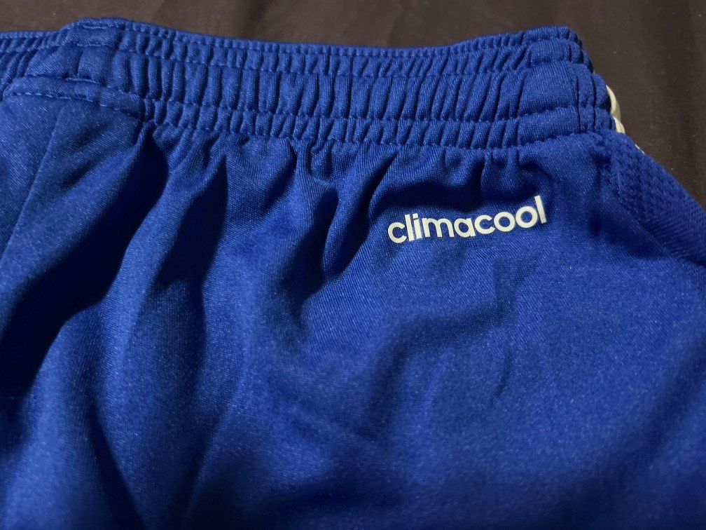 Adidas ClimaCool Royal Blue Athletic Shorts (Category: Shorts) located in Pasig City. Submitted by mixpicks (Listing ID 1459445940, Image 3). Description: - Royal blue Adidas shorts - Features ClimaCool technology for breathability - Elastic waistband with adjustable drawstring - Classic white stripe detail on the sides - Ideal for sports activities or everyday casual wear -13” long - Made in Cambodia - 28-32 waist line - logo at the back .