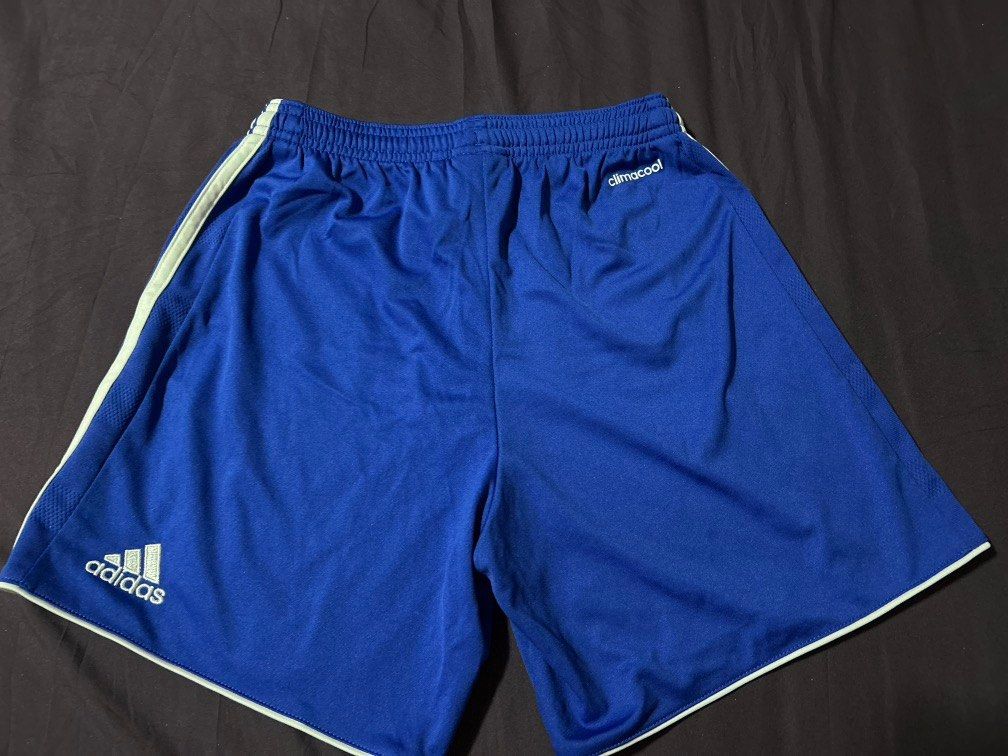 Adidas ClimaCool Royal Blue Athletic Shorts (Category: Shorts) located in Pasig City. Submitted by mixpicks (Listing ID 1459445940, Image 1). Description: - Royal blue Adidas shorts - Features ClimaCool technology for breathability - Elastic waistband with adjustable drawstring - Classic white stripe detail on the sides - Ideal for sports activities or everyday casual wear -13” long - Made in Cambodia - 28-32 waist line - logo at the back .