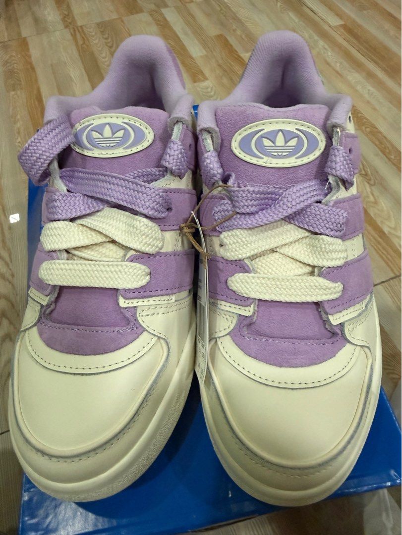 Adidas Forum 2000 W Off White Lilac (Category: Sneakers) located in Tabuk. Submitted by farawayluxe (Listing ID 1468042594, Image 3). Description: - Brand: Adidas Forum 2000 W - Colorway: Off-White and Lilac - Size: US 7 / UK 5.5 / EUR 38 2/3 - Condition: Brand new with original tag attached, stored in original box - Design: Chunky style featuring stylish suede stripes and thick laces - 100% authentic and ready to ship!.