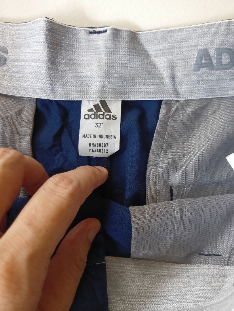 Adidas Golf Shorts (Category: Activewear) located in Rizal. Submitted by timeless_shop (Listing ID 1467840554, Image 3). Description: ORIGINAL ADIDAS Golf Shorts - Navy Blue 📏 SIZE & FIT: - Size on Tag: 32" -Width 16 inches flat laid - Size Fit 32-33 Waistline - Length: 22 inches Above knee / Golf Shorts cut 🏷️ Details: - Color: Navy Blue - Style: Golf Shorts / Chino Shorts - Design: Side pockets, Back welt pockets, - With Inner Silicon Grip Wa