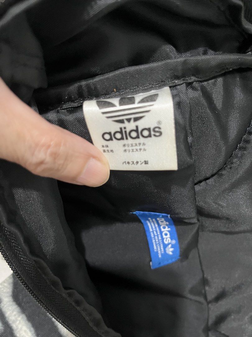 Adidas Originals Zebra Print Backpack (Category: Backpacks) located in Pasay City. Submitted by pinedamary44900 (Listing ID 1468050528, Image 3). Description: - Authentic Adidas Originals zebra print backpack - Large white trefoil logo on the front pocket - Zip main compartment with inner slip pocket and blue Adidas branding label - Adjustable shoulder straps with padded backing for comfort - Durable polyester material.
