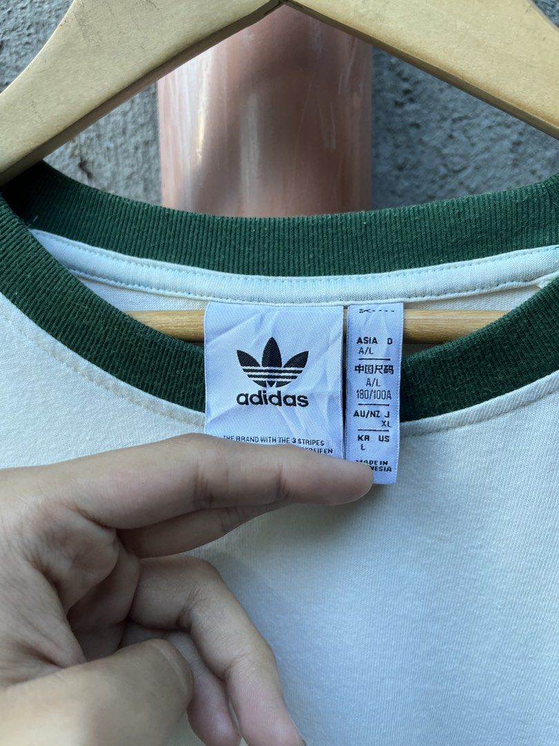 adidas ringer shirt (Category: Tshirts & Polo Shirts ) located in San Simon. Submitted by wegintal (Listing ID 1467925624, Image 3). Description: Adidas ringer tee 20.5 x 27.5 Cream colorway Good condition ₱450 freeship.