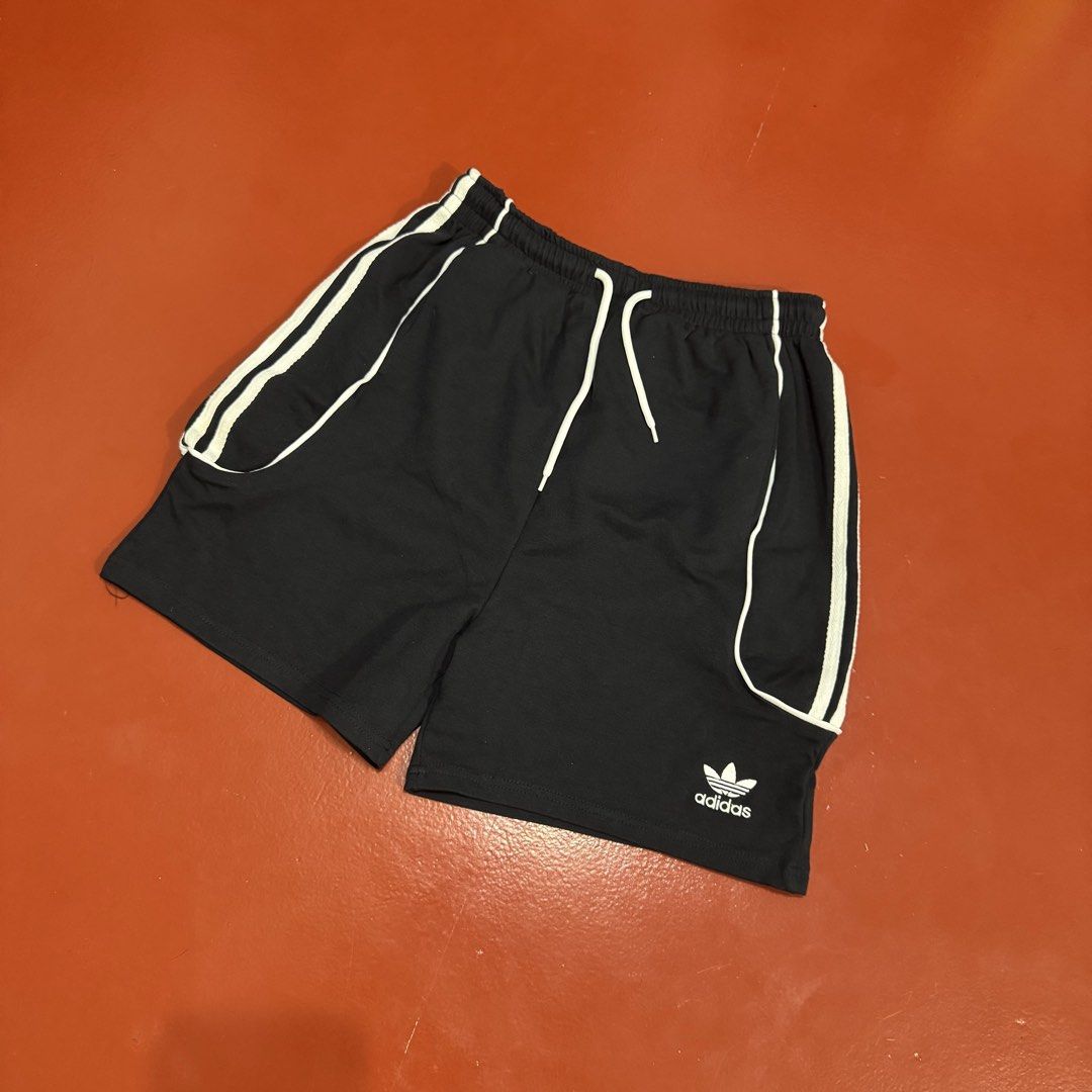 ADIDAS SHORTS (Category: Shorts) located in Pasig City. Submitted by buzzthrifty (Listing ID 1468008340, Image 1). Description: SIZE 26-32(34MAX) WAIST 17"LENGTH 11" HEM GOOD AS NEW .