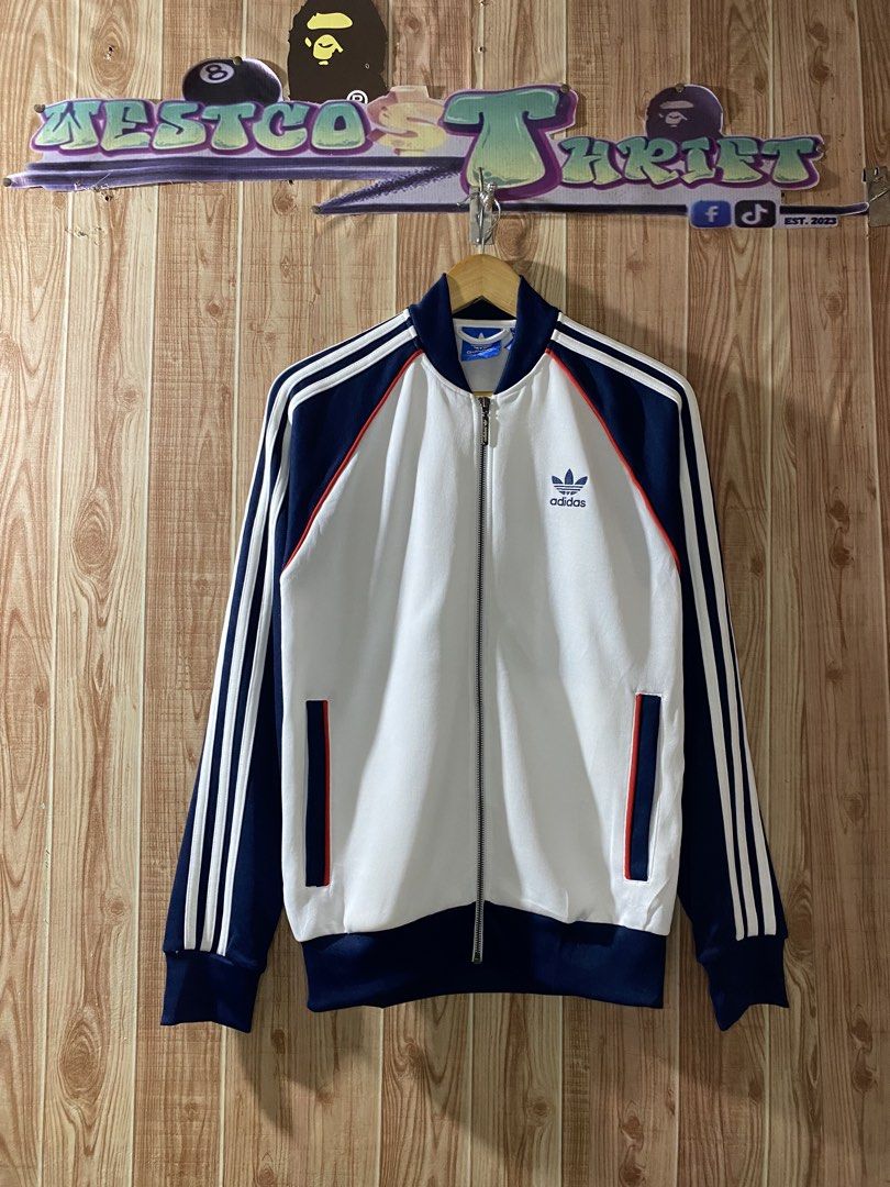 Adidas SST Track Top (Category: Coats, Jackets and Outerwear) located in Tagbilaran City. Submitted by westcost (Listing ID 1467937581, Image 1). Description: Adidas SST Track Top🔥 ▫️Width:21 ▫️Length:27 📌color rate:9.5/10 📌flawless 📌need wash.