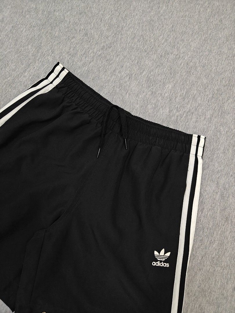 ADIDAS STRIPE SWIM SHORT (Category: Swim Trunks & Board Shorts) located in Bacolod City. Submitted by yobibstuffs (Listing ID 1467882975, Image 2). Description: ADIDAS STRIPE SWIM SHORT SIZE: SMALL DIMENSIONS WAISTLINE: 28-32 LENGTH: 15'5 LEG OPENING: 11 GOOD CONDITION NEED WASH 🧼🫧 PRICE: 799+SF OUTSIDE BACOLOD CITY 🏙️ 🌆 PM ME! 📥📥📥.