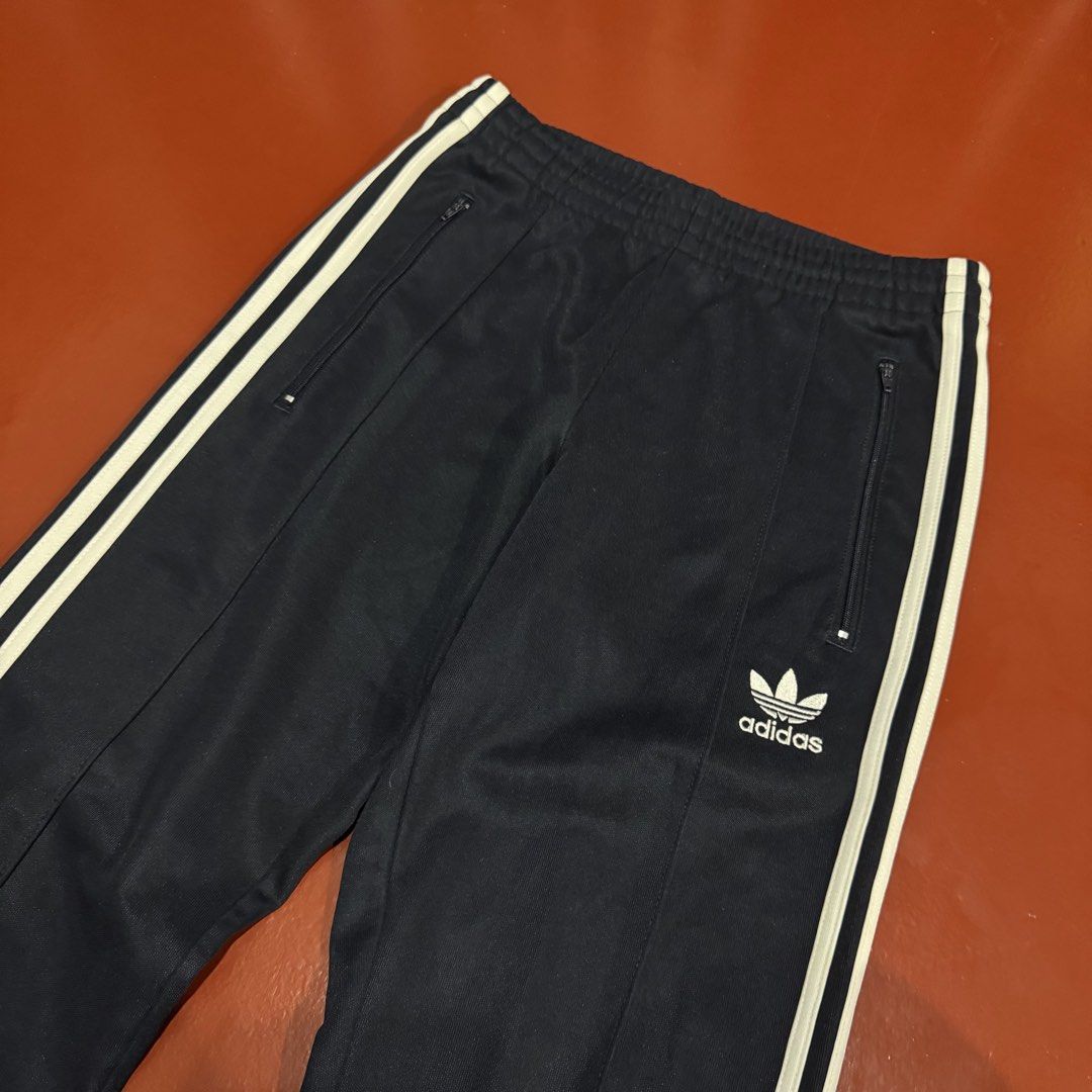 ADIDAS TRACK PANTS (Category: Joggers) located in Pasig City. Submitted by buzzthrifty (Listing ID 1467970612, Image 3). Description: SIZE 30-32WAIST 37"LENGTH EXCELLENT CONDITION NAVY BLUE ACTUAL COLOR .