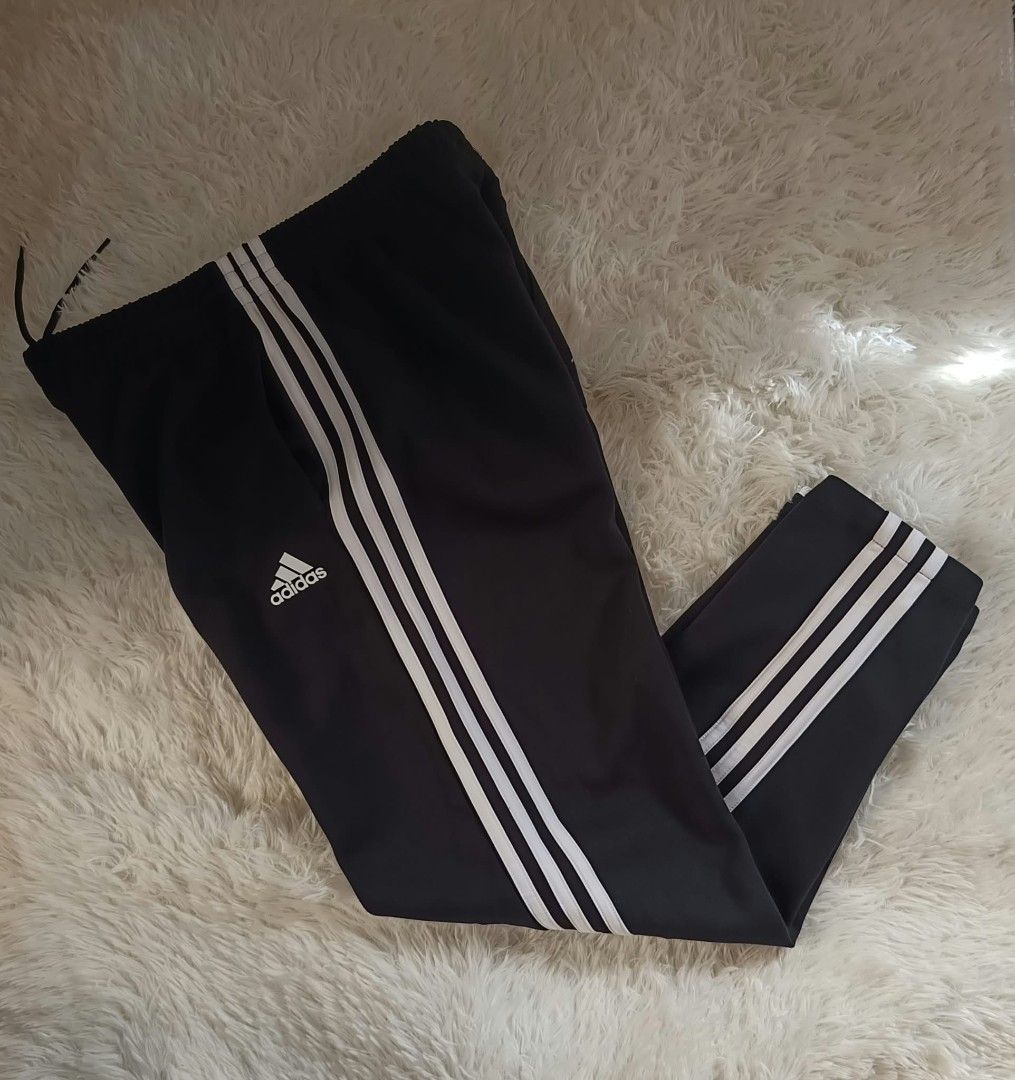 Adidas Track Pants (Category: Activewear) located in Bulacan. Submitted by clcclothing_shop (Listing ID 1468057622, Image 1). Description: XL on tag Dimes: Waistline 30-36 Length 37 Best fit Large to XL Excellent condition.