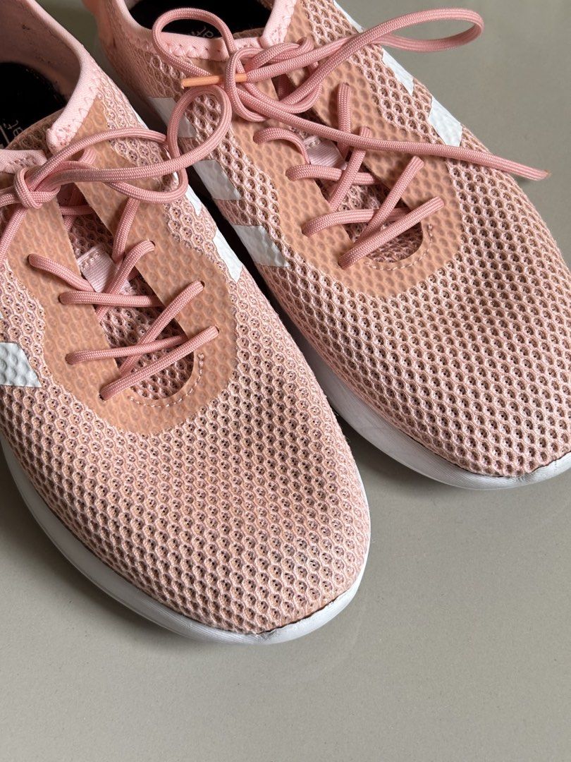 Adidas Yatra Float Pink Mesh Sneakers (Category: Sneakers) located in Bulacan. Submitted by prelovedbyjesel (Listing ID 1467924220, Image 2). Description: - Brand: Adidas - Color: Pink with clean white soles - Material: Breathable mesh, super lightweight - Closure: Lace-up with matching pink laces - Features: Adidas branding on heels and insoles, good grip underneath - Condition/Use: Perfect for casual walking or workouts.