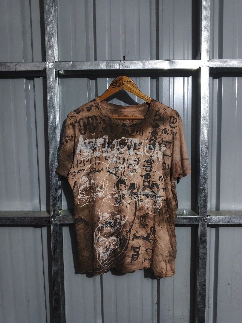 Affliction Distressed Condition (Category: Tshirts & Polo Shirts ) located in Bacolod City. Submitted by squarer00ts (Listing ID 1467944490, Image 1). Description: Affliction Distressed Condition •Size on tag: Large •Dimension: •Width 22 •Length 27 •₱1,200.