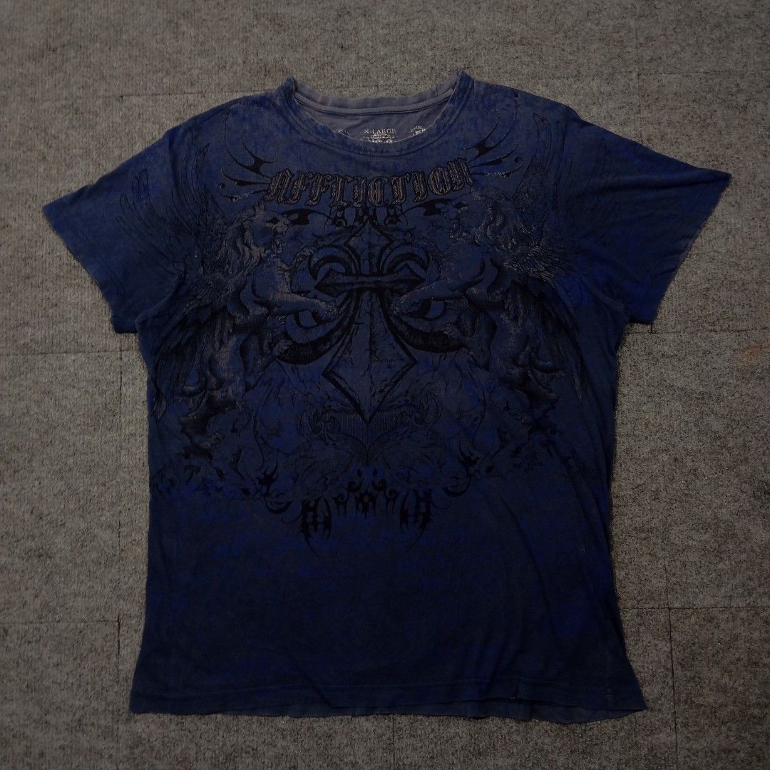Affliction Simultaneous Tshirt (Category: Activewear) located in Taguig. Submitted by sito. (Listing ID 1467884551, Image 1). Description: For sale! 📣 Affliction Simultaneous Tshirt Specs and measurements: • Size XL • Length 29 inches • Width 23 inches Condition Details: • Sign of use • Discoloration • Color rate: 8/10 • Overall Condition: 7/10 what a collectible piece! Price: ~ ₱765 Transaction Details: Location: Upper Bicutan, Taguig City, Met