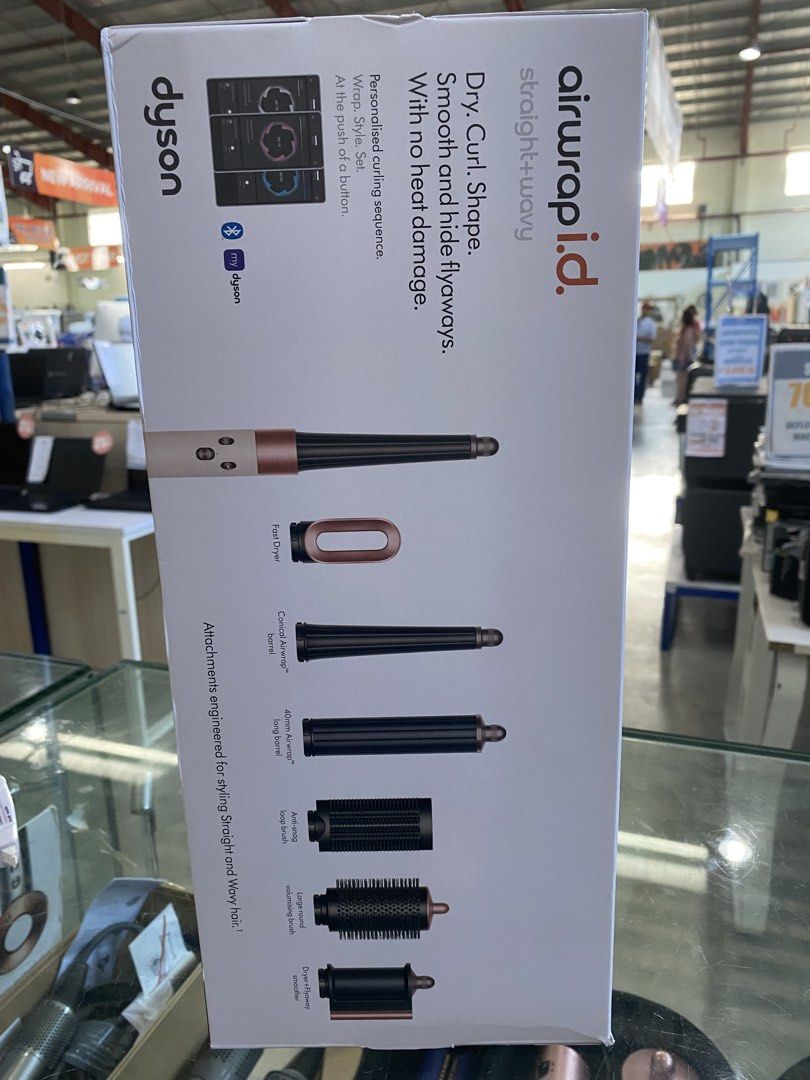 Airwrap ID multi-Styler & Dry Dyson (Category: Hair) located in Manila. Submitted by ann050612 (Listing ID 1467892650, Image 1). Description: Airwrap i.d straight + wavy Dry. curl.Shape. smooth Hide Flyaways With no heat damage Complete Accs Brandnew Attachment engineered for Styling and Wavy hair.