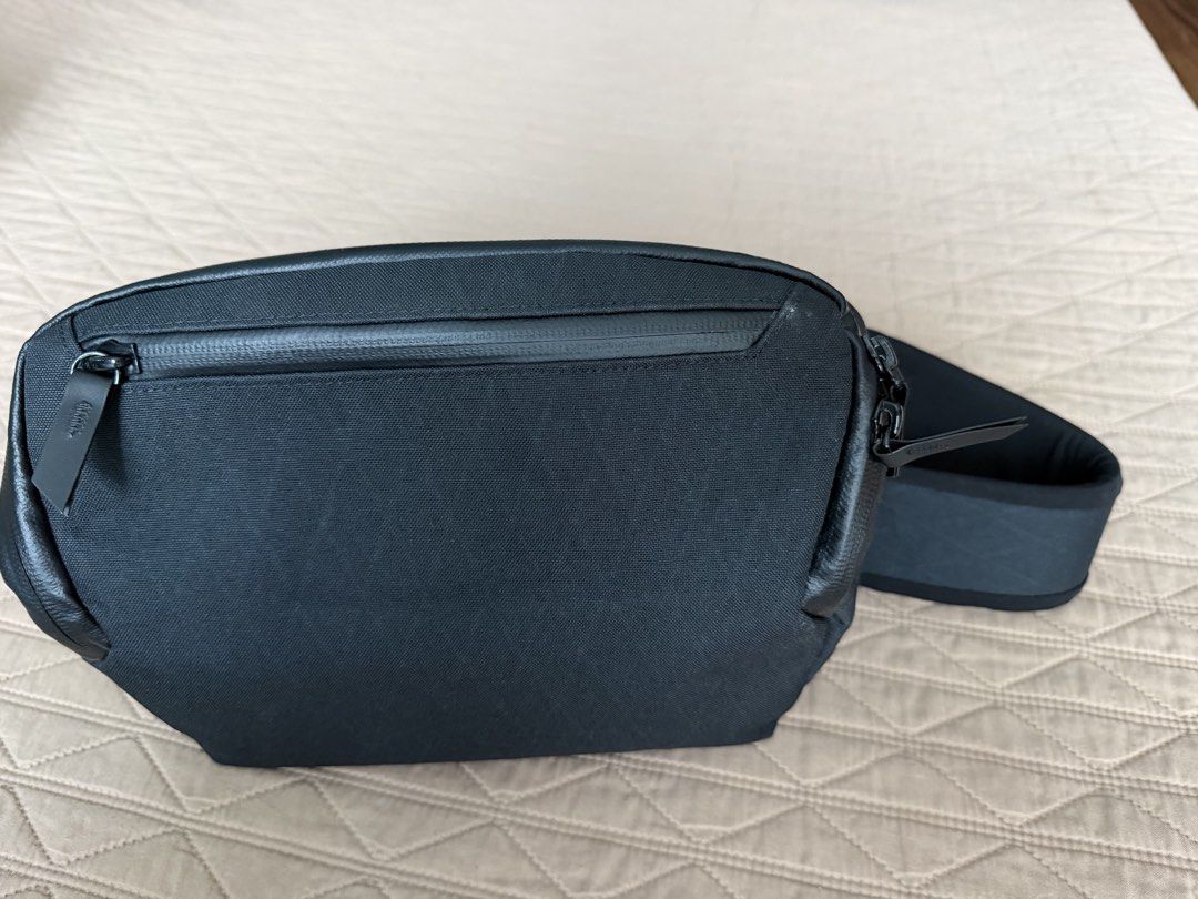 Alpaka Go Sling Vertex Pouch (Category: Sling Bags) located in Pasig City. Submitted by da__44 (Listing ID 1467897913, Image 2). Description: SRP: p6,490. To be sold only p4,500. slightly used. DECLUTTERING. - Brand: Alpaka - Color: Solid Black - Material: Durable exterior with weather-resistant zippers - Interior: High-visibility bright orange honeycomb ripstop lining - Organization: Multiple internal slip pockets and zippered mesh pouches - Com