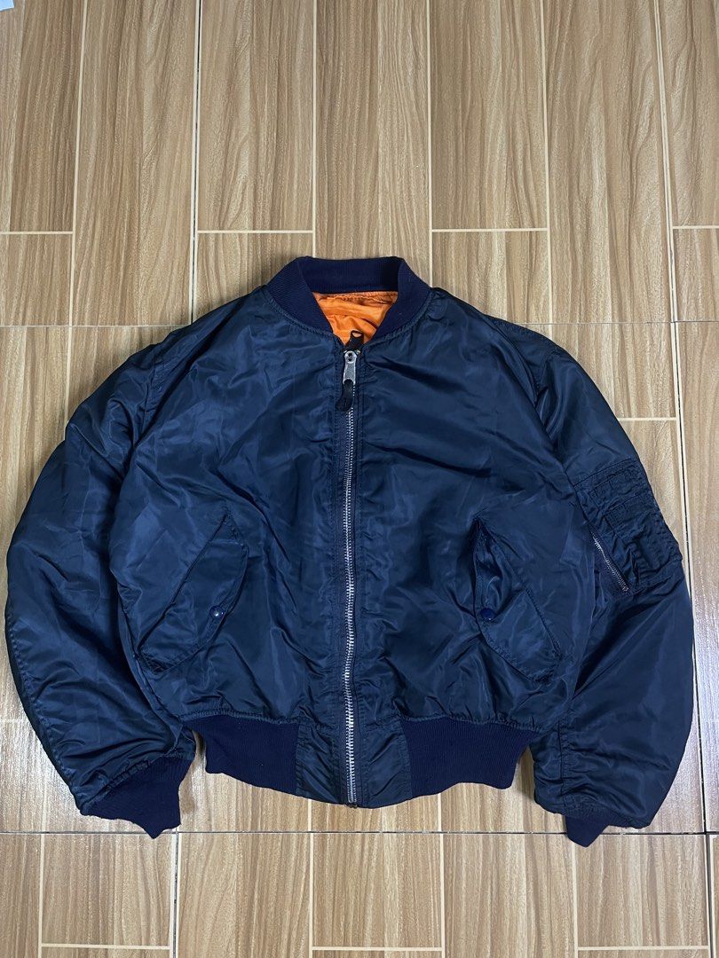 Alpha Industries Bomber Jacket Reverseble (Category: Coats, Jackets and Outerwear) located in Naga. Submitted by black-market00 (Listing ID 1468002485, Image 1). Description: Width 25 Lenght 26 Boxy type No issue.
