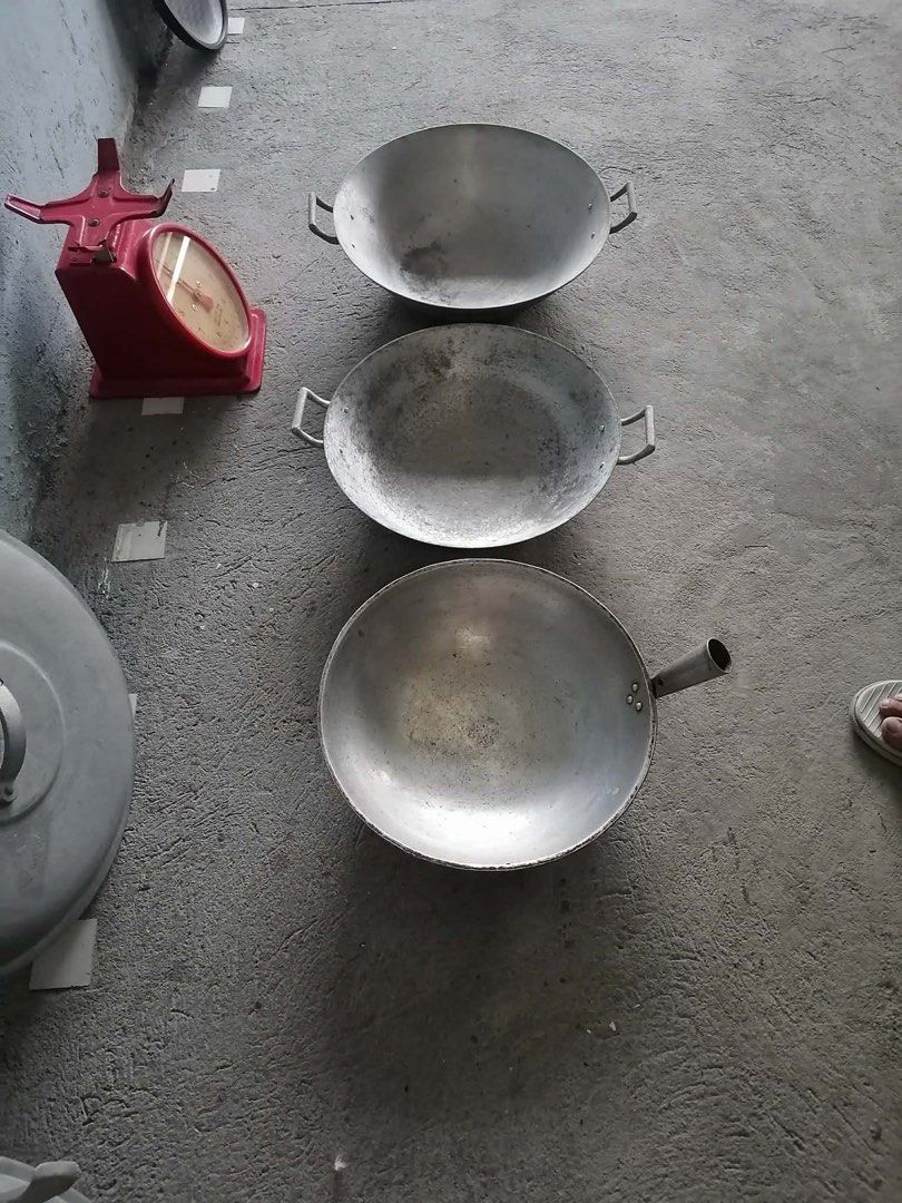 Aluminium Woks Colanders Lids Utensils Scale (Category: Cookware & Accessories) located in Makati City. Submitted by cathymadrid18 (Listing ID 1467956768, Image 2). Description: - Complete kitchen gear bundle ideal for starting out or upgrading your setup - Includes multiple aluminium woks, colanders with handles, and matching lids - Comes with two wooden-handled cooking utensils for daily use - Features a vintage-style red mechanical weighing sc