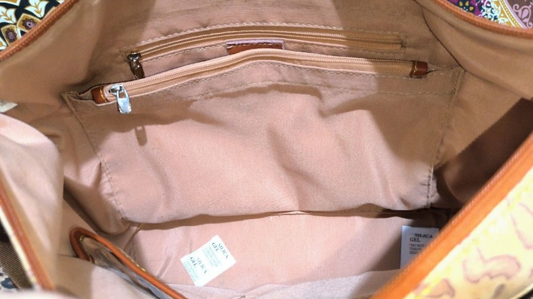 Alviero Martini Sling Bag (Category: Cross-body Bags) located in Quezon City. Submitted by 88bagelya_ni_rhen88 (Listing ID 1463757202, Image 3). Description: - Classic Alviero Martini sling / body bag - Iconic map print - Leather trim and strap - Zipper closure on front pocket - Main compartment with zipper closure - Great for everyday use .