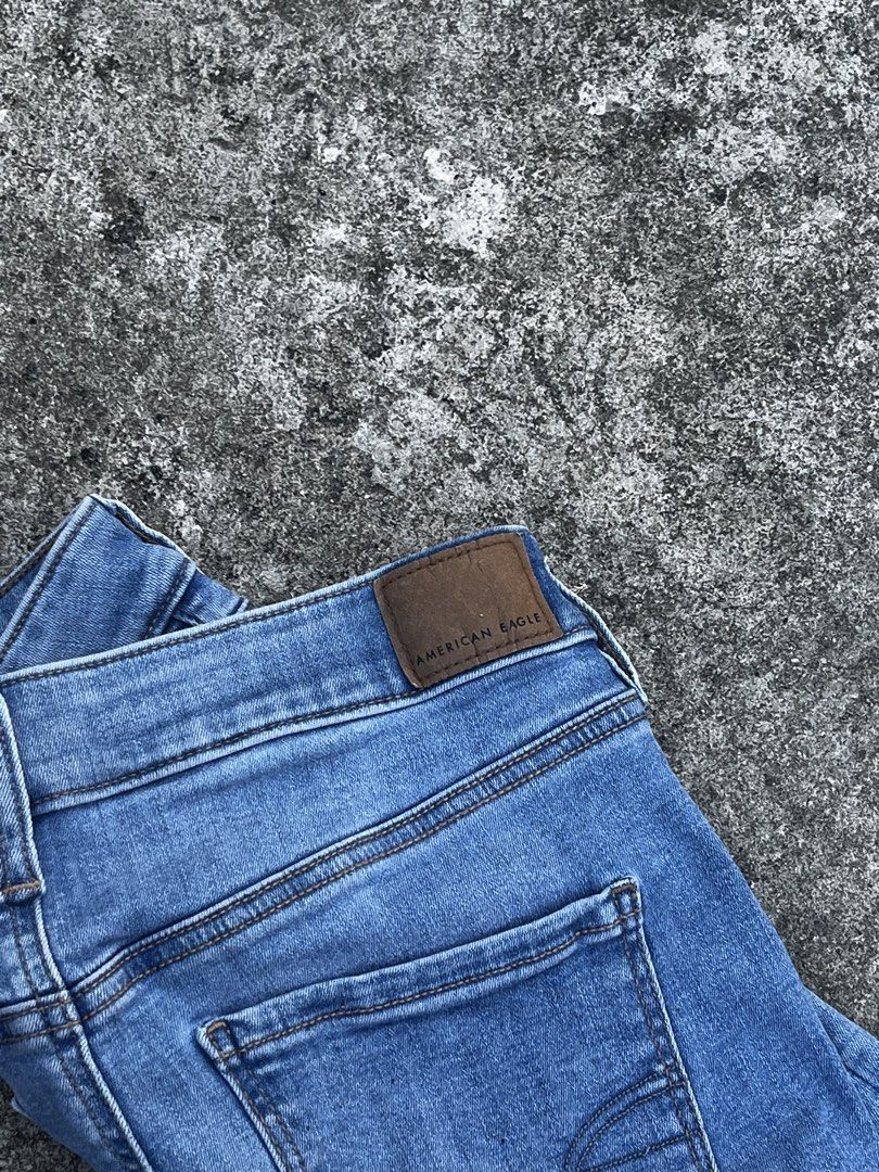American Eagle Denim Jeans (Category: Jeans) located in San Fernando. Submitted by angelhave_wings (Listing ID 1468058377, Image 3). Description: - Brand: American Eagle Outfitters - Wash: Medium blue - Style: Classic 5-pocket denim jeans with contrast stitching - Details: Standard button/zip fly, belt loops, and back leather brand patch - Condition: Excellent everyday staple piece - Ships fast within the Philippines via Carousell Official Delive