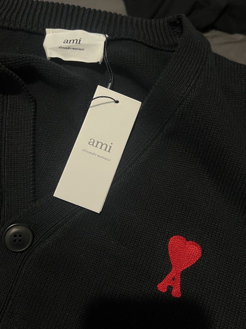 Ami small logo cardigan (Category: Coats, Jackets and Outerwear) located in Las Pinas. Submitted by thriftstax (Listing ID 1468051153, Image 3). Description: excellent pristine condition with hang tags medium on tag 22x24.
