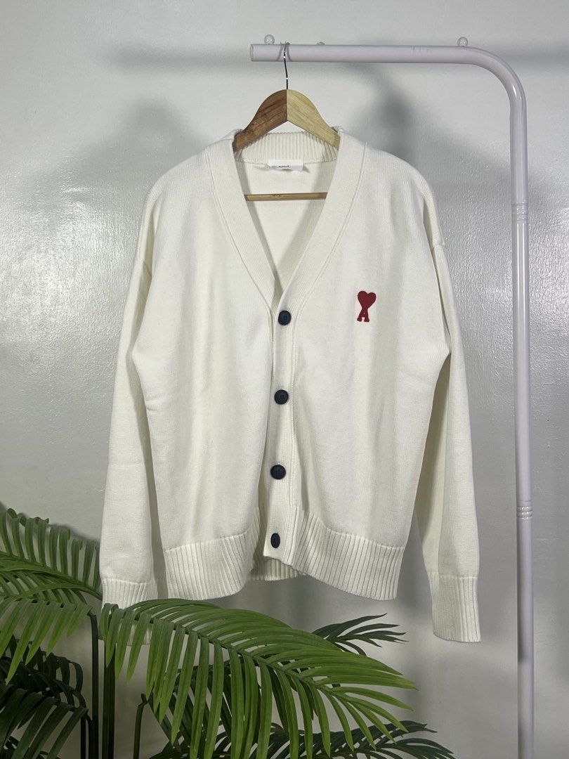 Ami small logo cardigan (Category: Coats, Jackets and Outerwear) located in Las Pinas. Submitted by thriftstax (Listing ID 1468051729, Image 1). Description: excellent pristine condition with hang tags medium on tag 22x25.