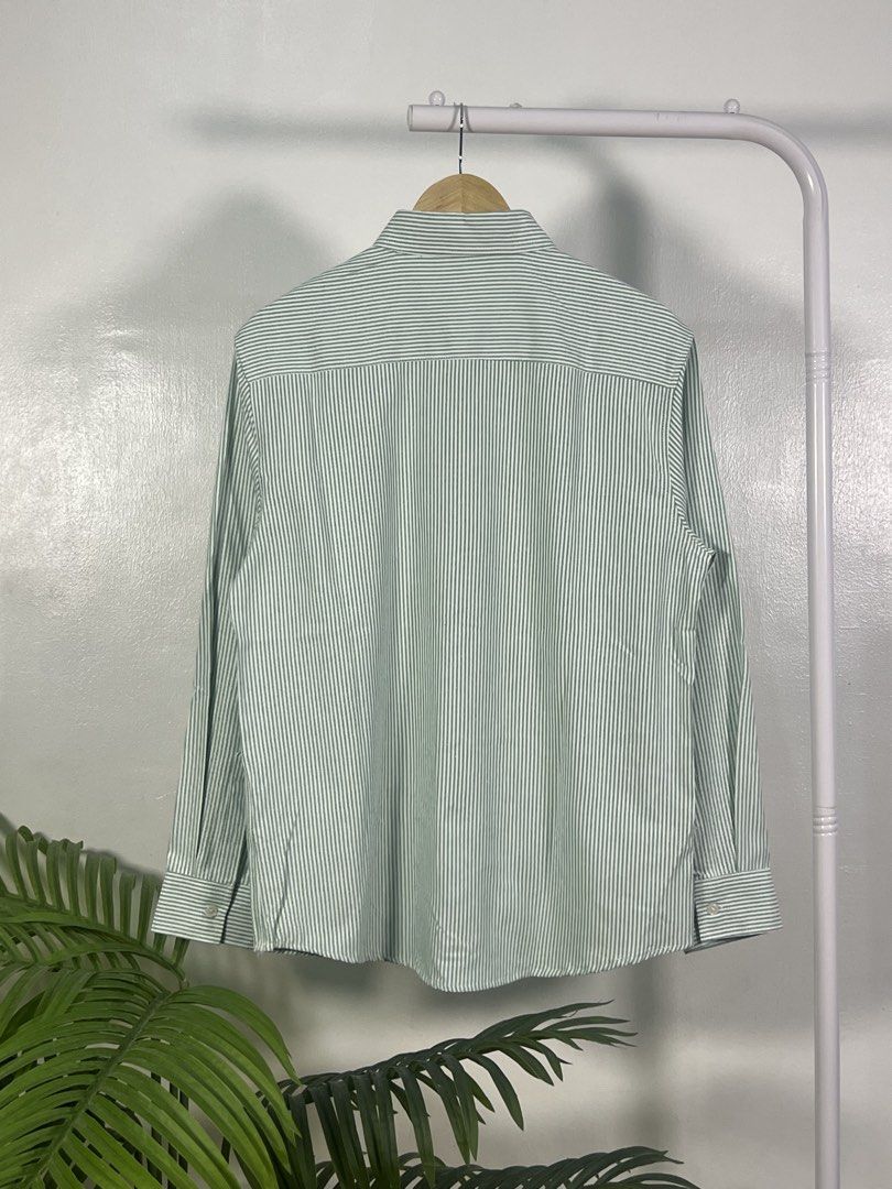 Ami small logo longsleeves (Category: Formal Shirts) located in Las Pinas. Submitted by thriftstax (Listing ID 1468051413, Image 2). Description: excellent pristine condition with hang tags large on tag stripes green 21x29.