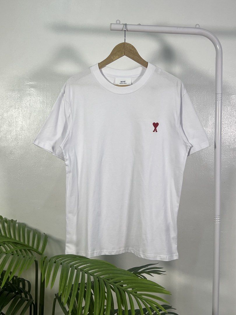 Ami small logo tee (Category: Shirts) located in Las Pinas. Submitted by thriftstax (Listing ID 1468051658, Image 1). Description: excellent pristine condition with hang tags medium on tag 21x26.