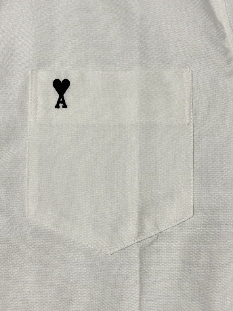 Ami small pocket logo longsleeve (Category: Formal Shirts) located in Las Pinas. Submitted by thriftstax (Listing ID 1468051765, Image 3). Description: excellent pristine condition with hang tags large on tag 21x29.