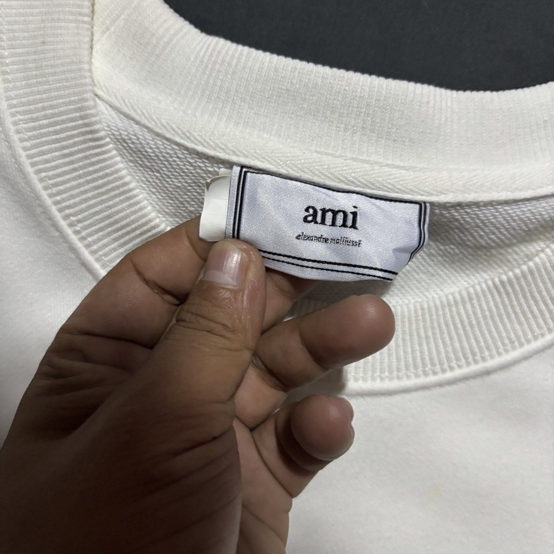 AMI TRIPLE WHITE SWEATSHIRT (Category: Hoodies) located in Taytay. Submitted by dwinsapparel (Listing ID 1467936228, Image 3). Description: AMI TRIPLE WHITE SWEATSHIRT W-21.5 L-28 EXCELLENT CONDITION NEED WASH COMPLETE TAGS.