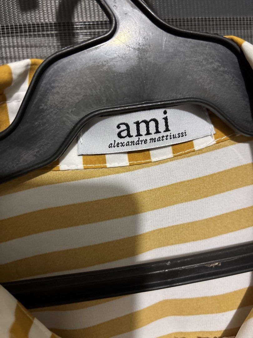 ami white and yellow polo (Category: Longsleeves) located in Manila. Submitted by iyahpreloved_ (Listing ID 1468017563, Image 3). Description: free size!.