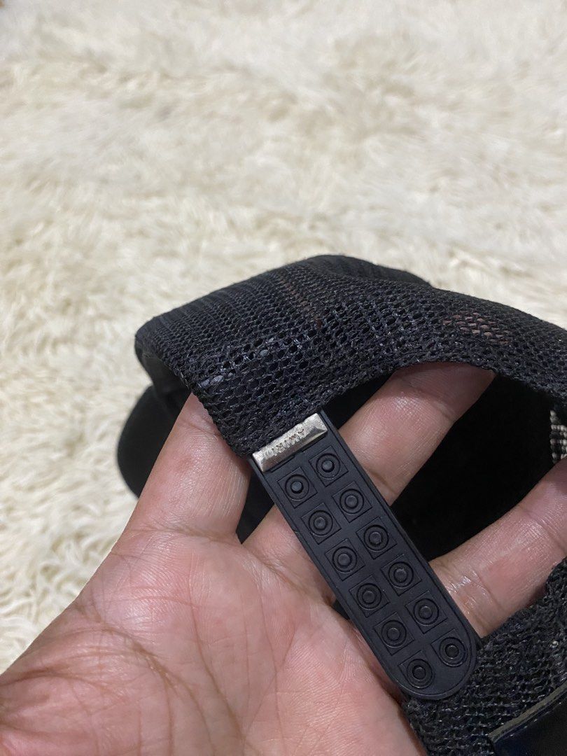 AMIRI Embroidered Trucker Hat Black (Category: Caps & Hats) located in Manila. Submitted by switchcity (Listing ID 1467878091, Image 3). Description: - Brand: AMIRI - Color: Classic Black - Design: Embroidered logo on front with breathable mesh backing - Fit: Adjustable snapback closure for a custom fit - Material: Premium cotton and polyester blend, Made in USA - Condition: Clean care label attached, great for daily casual wear.