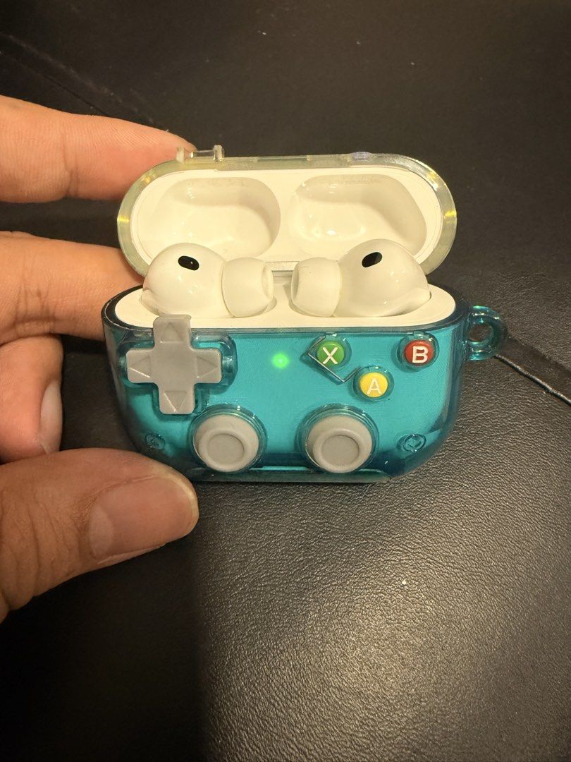 Apple AirPods Pro (3rd generation) with controller case (Category: Headphones & Headsets) located in Makati City. Submitted by dericktizon (Listing ID 1468048031, Image 1). Description: - Bought last May 2026 only - Model: Apple AirPods Pro 3rd Gen (Model A3064) - Condition: Fully functional, super crisp sound, and strong battery life - Inclusions: Clean earbuds, silicone tips, and a unique turquoise transparent controller-themed case with D-pad 