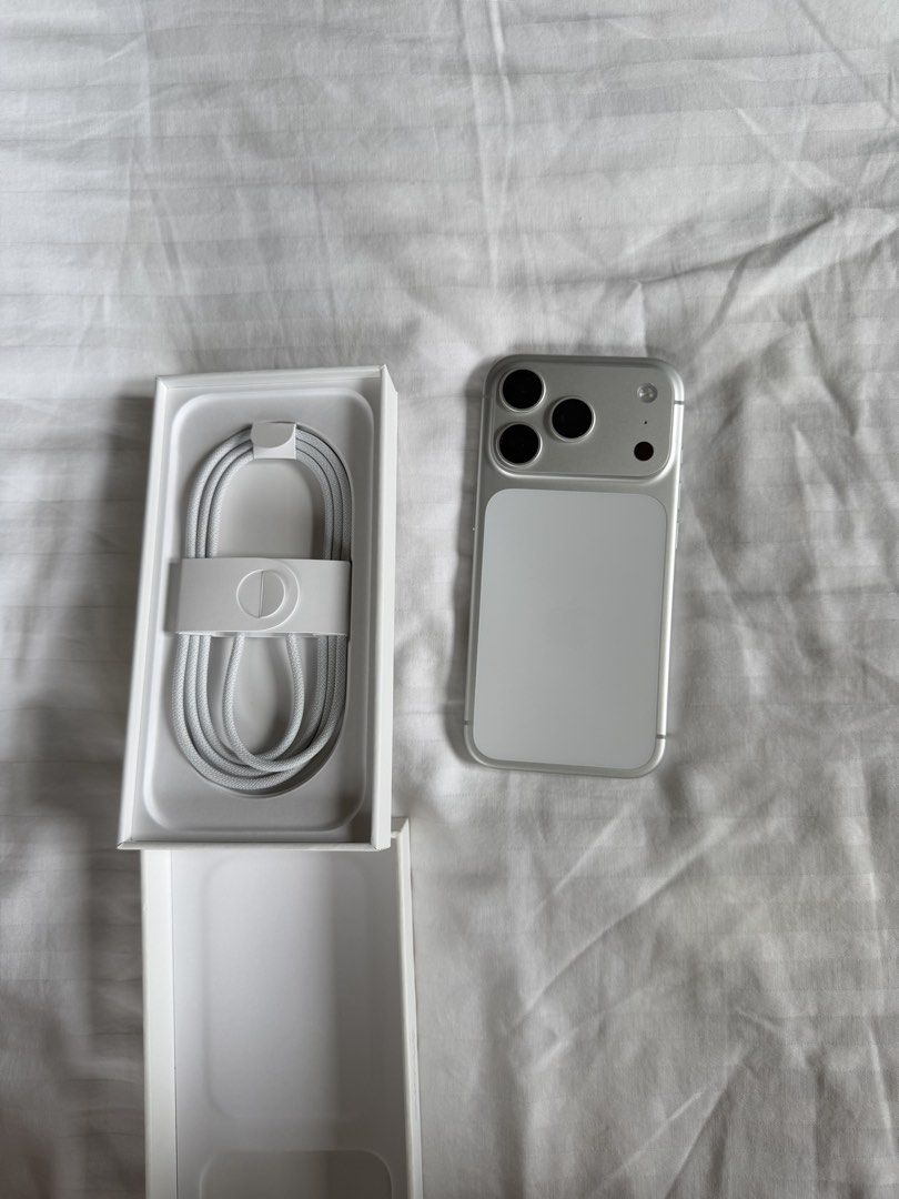 Apple iPhone 17 Pro 512GB Silver (Category: iPhone 17 Series) located in Makati City. Submitted by inezlebron (Listing ID 1467904307, Image 2). Description: Apple iPhone 17 Pro in silver with 512GB storage capacity. Unlocked model, works with any carrier. Battery maximum capacity stands at 98 percent with 258 cycle counts. Original box and USB-C charge cable included in the package. There is a small gasgas on bottom left corner. Comes with temper