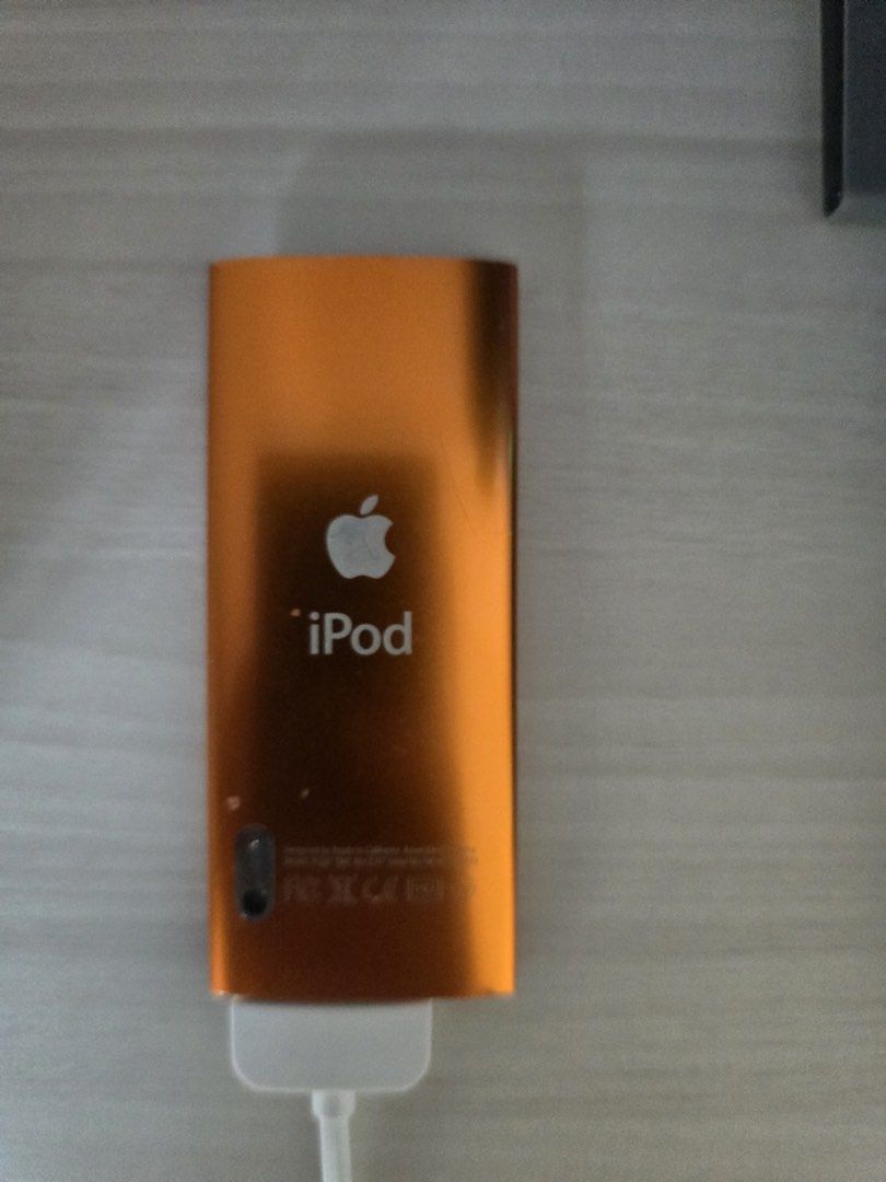 Apple iPod nano orange 4th Gen (Category: Portable Music Players) located in Manila. Submitted by milleshoppppp (Listing ID 1467866723, Image 2). Description: Vintage Ipod Nano 4th gen (For Parts / Repair / Flash-Modding Project) - Condition: It works, but sometimes it does not open because of the battery malfunctioning. - buttons and aux outlet all working well - battery needs to be replaced (drained) - screen has a black spot - unit only, no bo