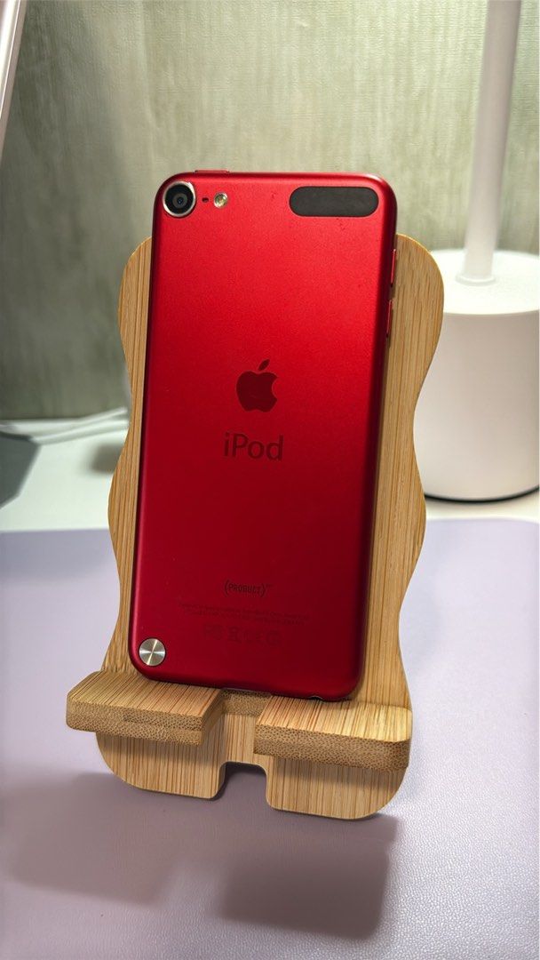 Apple iPod touch 5th Generation (Product Red) 32GB (Category: Portable Music Players) located in Manila. Submitted by mochaclosetph (Listing ID 1467929095, Image 2). Description: - Model: Apple iPod touch 5th Generation (Model: ND749ZP/A) - Color: Eye-catching Product Red aluminum back with loop button - Storage: 32GB total capacity (25.7GB available) - Software: Running iOS 9.3.5 - Perfect as a reliable portable music player or a nice collector'