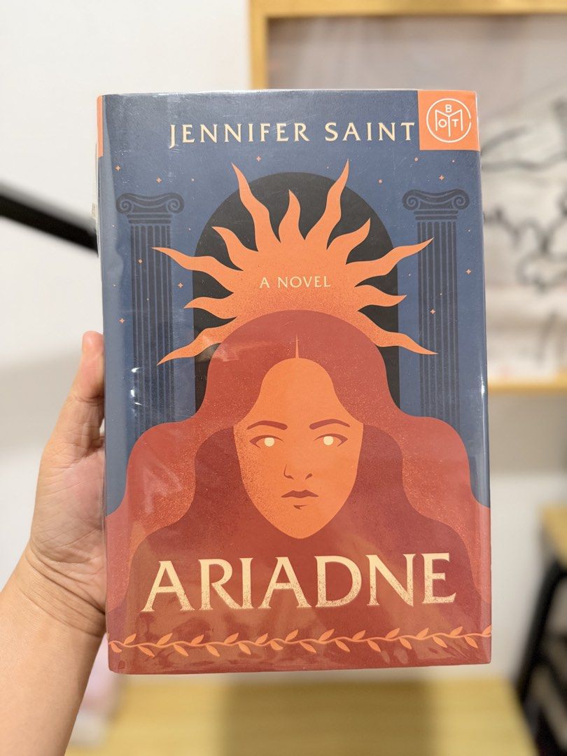 Ariadne by Jennifer Saint (Category: Storybooks) located in Toledo. Submitted by alziaron (Listing ID 1467956485, Image 1). Description: 📚 Title: Ariadne by Jennifer Saint Edition: Hardcover, Book of the Month (wrapped in plastic) Condition: See attached photos. With light foxing spots on top and bottom page edges Genre: Greek mythology retelling (Ariadne and Theseus) Mode of Payment 💰 Payment first through maribank/gotyme Mode of Delivery 🚚 B