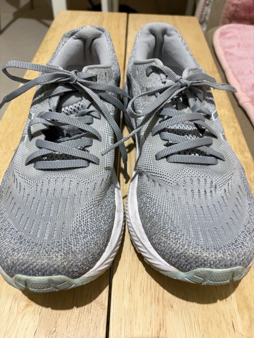 ASICS GT-2000 9 Grey Running Shoes (Category: Sneakers) located in Paranaque City. Submitted by greatfinds108 (Listing ID 1467867064, Image 3). Description: ASICS GT-2000 9 running shoes in grey. FlyFoam cushioning tech in the midsole. Mesh upper material keeps airflow steady during runs. Grey laces tied up front. Solid rubber outsole underneath for traction. Supportive stability build for road miles. Light wear on the soles and uppers. For pick 