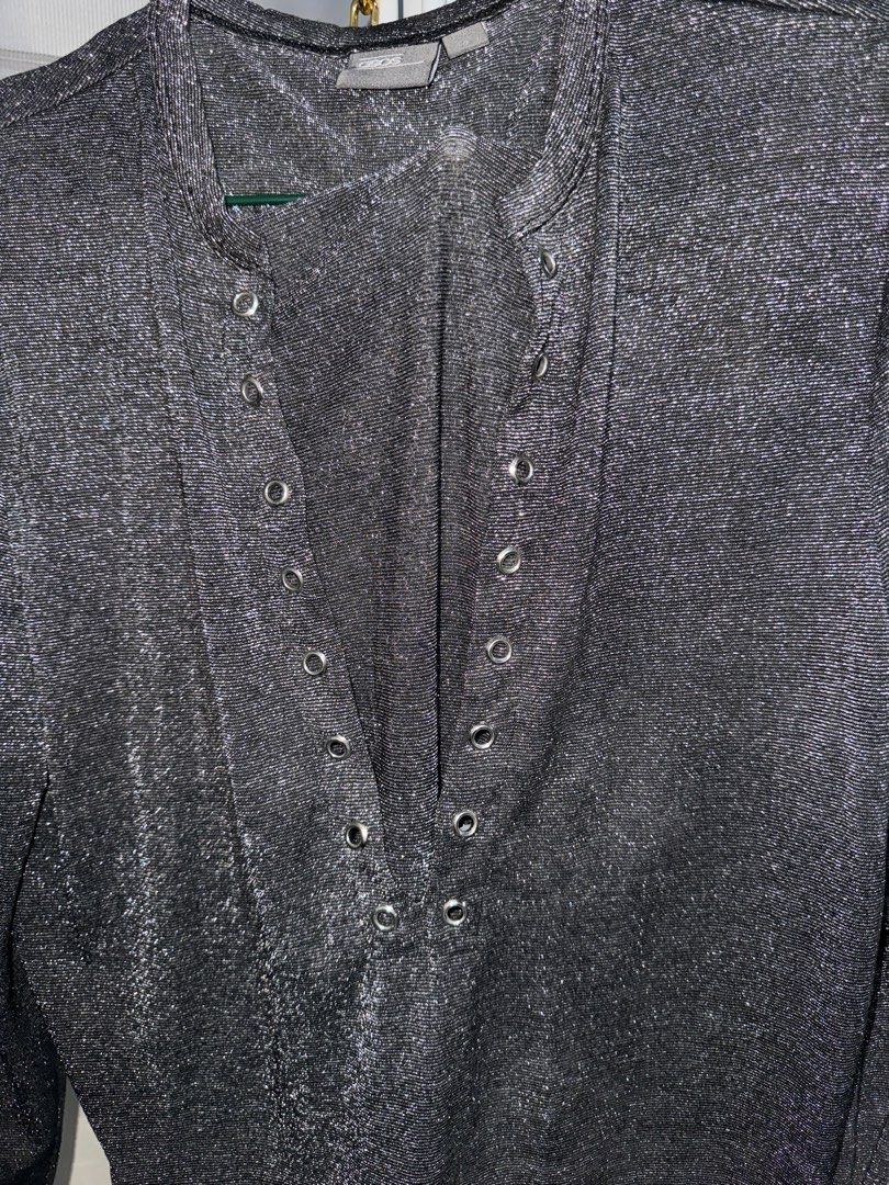ASOS Metallic Silver Long Sleeve Top Size S (Category: Longsleeves) located in La Trinidad. Submitted by prelovedandfindsbyji (Listing ID 1467930125, Image 3). Description: - Brand: ASOS - Color: Metallic silver with sparkly fabric - Size: S (fits chest 36-38 inches) - Details: Front button placket with metal grommet accents - Material: 46% polyester, 26% viscose, 14% polyamide, 14% metallised fibres - Origin: Made in Turkey.