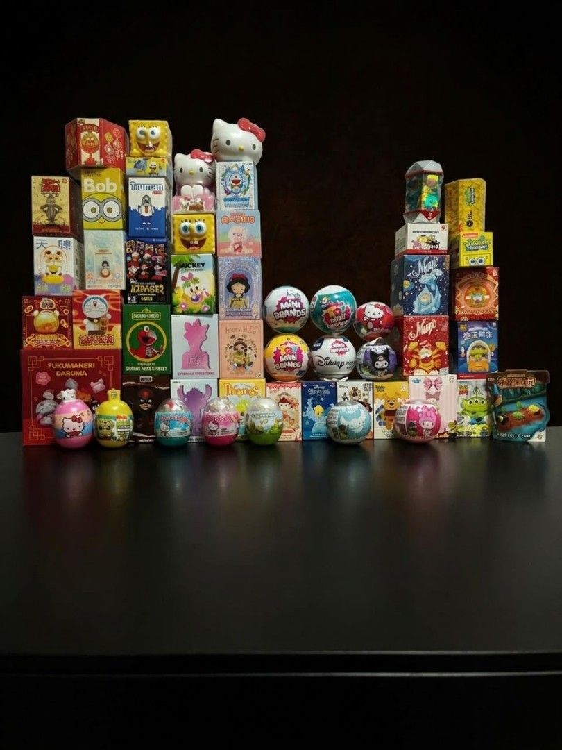 Assorted blind box (Category: Designer & Blind Box Toys) located in Singapore. Submitted by joyceysl2886658 (Listing ID 1467993454, Image 1). Description: - Massive bundle of unopened blind boxes and mystery capsule toys - Features popular characters: Kitty, SpongeBob, Disney princesses, and Minions - Ideal for toy collectors or gift-giving - Selling the whole lot together as one bundle - Meet-up or delivery options available upon request.