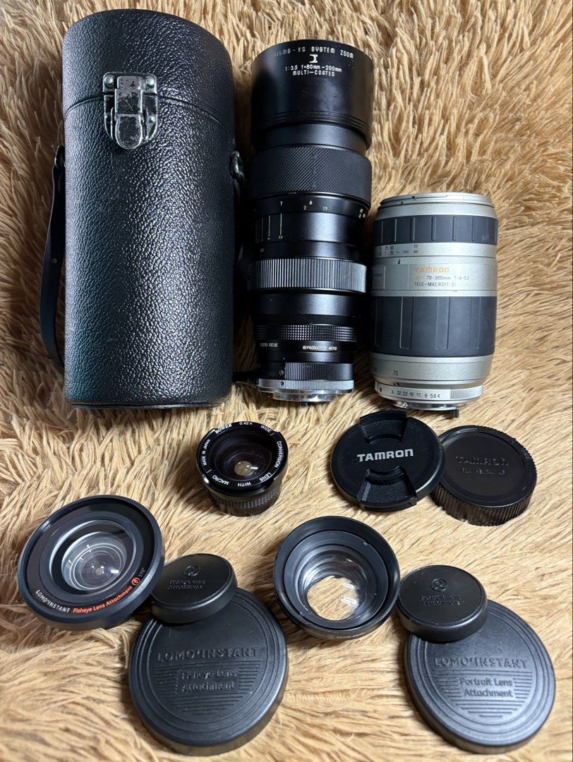 Assorted Camera Lenses (Category: Lens & Kits) located in Caloocan City. Submitted by ivandave09 (Listing ID 1467904199, Image 1). Description: Assorted Camera Lenses Sigma XQ System Zoom 80-200 f/3.5 Macro (unknown mount) - With leather hardcase and lens filter - Refer to pics for condition - Needs cleaning, has fungus. - Selling AS IS Tamron Tele-macro(1:2) 70-300 1:4-5.6 LD for Pentax AF - With caps - Refer to pics for condition - Needs cleani