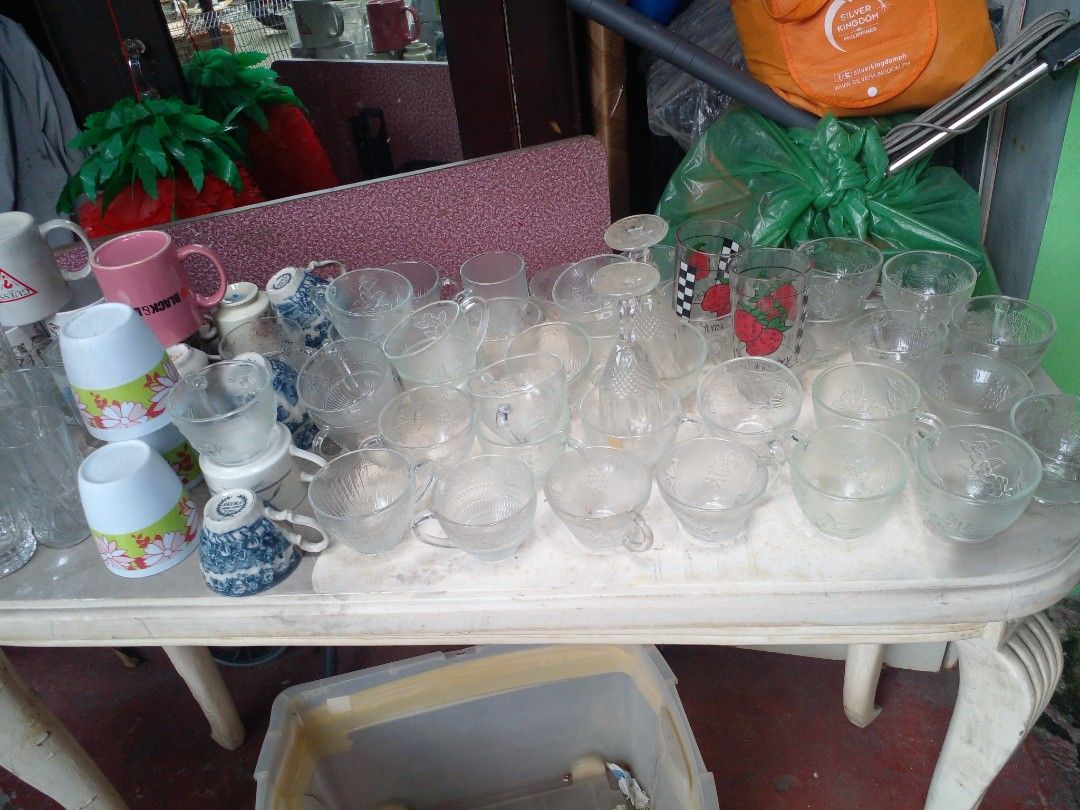 Assorted Glassware Coffee Mugs and Cups Collection (Category: Coffee & Tea Tableware) located in Quezon City. Submitted by madelrivera (Listing ID 1467999236, Image 1). Description: - Massive bundle of mixed glass coffee cups, clear mugs, and printed drinking glasses - Includes patterned glass teacups, adorable strawberry tumblers, and classic ceramic mugs - Various sizes and unique designs mixed together - Ideal for parties, family gatherings, o