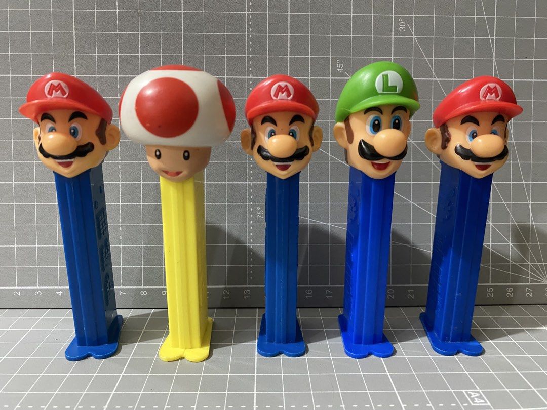 Assorted PEZ Candy Dispensers / Disney / Nintendo Characters / Ninja Turtle / Etc. (Category: Character Goods) located in Manila. Submitted by declutterthingzzz (Listing ID 1468012968, Image 3). Description: - Includes popular franchises: Mario, TMNT, Disney, Spider-Man, Pikachu, Lightning McQueen, and more - All items stand upright properly and mechanisms work fine - Price starts at 100. Price varies. Please pm thank you.