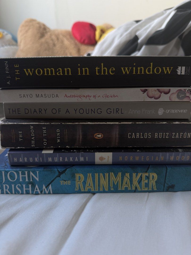 Assorted Romance/Mystery Books (Category: Storybooks) located in Quezon City. Submitted by jajachandesu (Listing ID 1467916406, Image 2). Description: Hi! Selling this bundle for only 800 pesos plus free shipping via j&t only. Norweigan wood - haruki murakami The rainmaker - john grisham Autobiography of a geisha - sayo matsuda Diary of a young girl - anne frank Woman in the window - aj finn Shadow of the wind - carlos ruiz zafron.