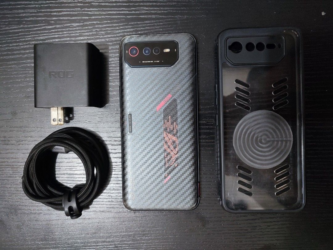 Asus ROG Phone 6 5G | 12/256 NO ISSUE (Category: Asus) located in Manila. Submitted by mistralstore (Listing ID 1468005833, Image 1). Description: FOR SALE ONLY 13500 FIX RUSH | FIRST OWNER AKO. ROG Phone 6 5G | Gaming Phone ALL WORKING NO ISSUE | NO OVERHEATING | NO HISTORY OF REPAIR | NO AMOLED BURN | 98% PRESENTABLE NO DENTS/SCRATCHES Inclusions: Unit, Case, Original 65w Brick, Type c to c Ugreen 2meters Original | Tempred Glass & Carbon Fiber