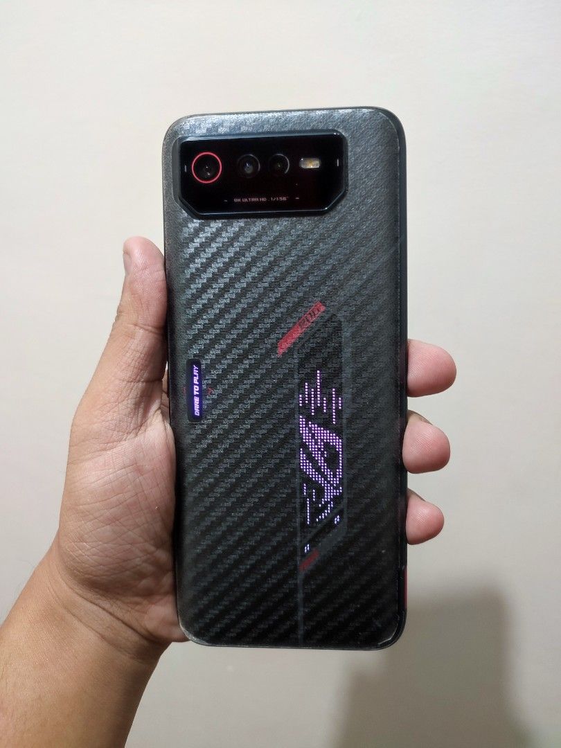 Asus ROG Phone 6 5G | 12/256 NO ISSUE (Category: Asus) located in Manila. Submitted by mistralstore (Listing ID 1468005833, Image 2). Description: FOR SALE ONLY 13500 FIX RUSH | FIRST OWNER AKO. ROG Phone 6 5G | Gaming Phone ALL WORKING NO ISSUE | NO OVERHEATING | NO HISTORY OF REPAIR | NO AMOLED BURN | 98% PRESENTABLE NO DENTS/SCRATCHES Inclusions: Unit, Case, Original 65w Brick, Type c to c Ugreen 2meters Original | Tempred Glass & Carbon Fiber