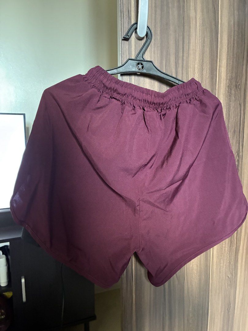 Athletic Running Shorts Bundle (Maroon, Navy, Grey) (Category: Shorts) located in Las Pinas. Submitted by mrcolorless (Listing ID 1467910430, Image 2). Description: - Bundle (2 black, 2 dark grey, 2 maroon, 1 navy blue) - Four colors: Maroon, Navy Blue, and Dark Grey, Black - Lightweight, quick-dry fabric with built-in inner lining - Elastic waistband with adjustable black drawstring - Breathable perforated ventilation details on the sides - Idea