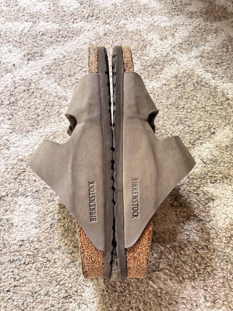 Auth Preloved Birkenstock Arizona (Category: Slippers and slides) located in Paranaque City. Submitted by silentstone.dolphin (Listing ID 1467861019, Image 3). Description: With minimal sign of used.. Stone Color.. Brass Buckle.. Visible Print.. Size 39N.. Clean&Ready to Wear..✅ Super Nice in Actual😍.