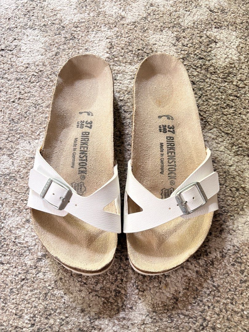 Auth Preloved Birkenstock Rio-Madrid (Category: Slippers and slides) located in Paranaque City. Submitted by silentstone.dolphin (Listing ID 1467874286, Image 1). Description: White Color.. Visible Print.. Size 37N.. Clean&Ready to Wear✅ Super Pretty in Actual😍.