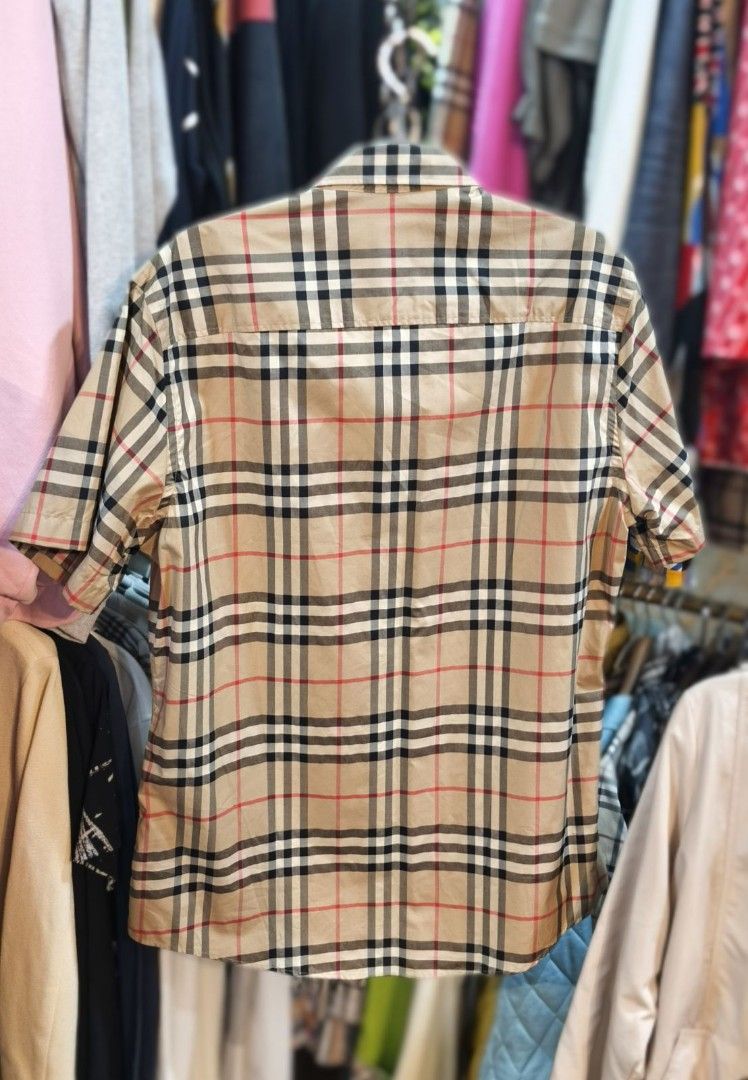 Authentic Burberry Plaid Polo With Tag (Category: Formal Shirts) located in La Trinidad. Submitted by designerluxeshop (Listing ID 1467997427, Image 3). Description: Brand-new Burberry polo with tag size medium, 💯% authentic, in excellent condition, free shipping, message me if interested, onhand ready to ship.