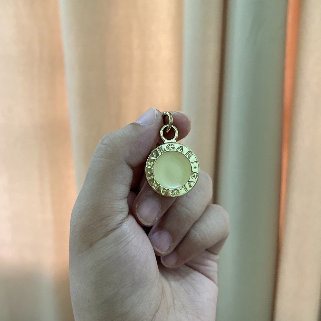 Authentic Bvlgari Gold Tone Pendant (Category: Necklaces) located in Manila. Submitted by princess.01.1 (Listing ID 1467849459, Image 3). Description: Authentic but wala na yung box. It was a gift. Doesn’t tarnish kahit ilang years na rarely used lang Looks best as a necklace, but can also be used as bag charm or keychain I have a box na bvlgari din but not yung mismong box niya. Sold separately .