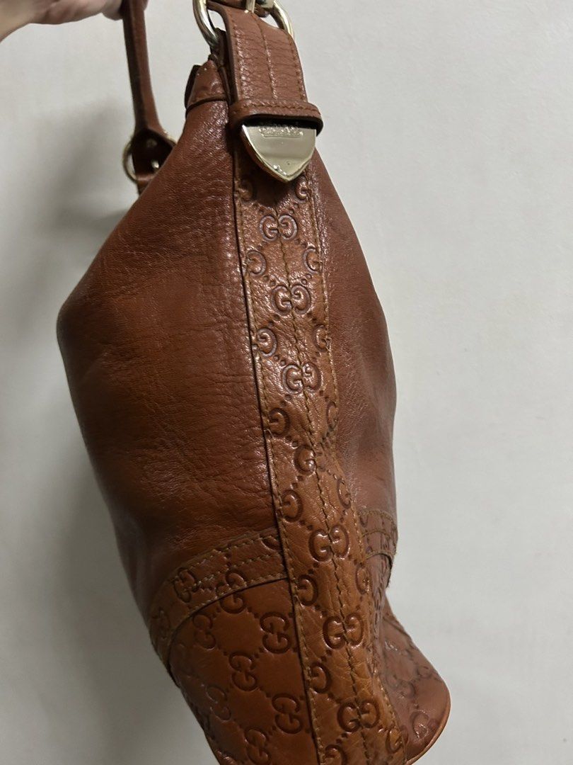[AUTHENTIC] Gucci Hobo Brown Leather (Category: Luxury Bags & Wallets) located in San Juan City. Submitted by denisegoesshopping (Listing ID 1467985372, Image 2). Description: Preloved Gucci hobo bag in brown leather. Good condition with minimal and noticeable flaws (water marks). Medium size .