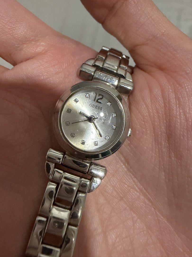 Authentic Guess Watch (Category: Women's Watches) located in Manila. Submitted by snoopydoopydoo (Listing ID 1467979734, Image 2). Description: - model: Petite WO124L1 (discontinued design) - never been used - no box - bought for P9,895 (discounted) - stainless steel, mineral glass, quartz analog, splashproof, and rain resistant.